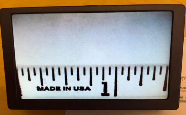 This photo is of the old Amigo, showing a ruler, at the minimum size level and widest field of view of 1.5" inches.