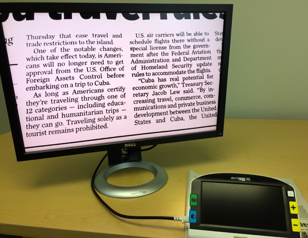 Much more comfort when viewing on a larger HD monitor. This photo is Close-Up of the *New Amigo HD, displaying 2 Newspaper Columns, sending the Amigo HD image to a HD Monitor. Same width, but the font is much bigger!