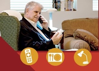 Person sitting with medication bottle in right hand