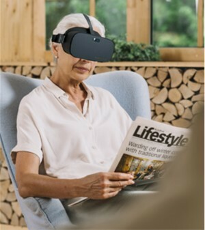 Person reading newspaper wearing Vision Buddy V2