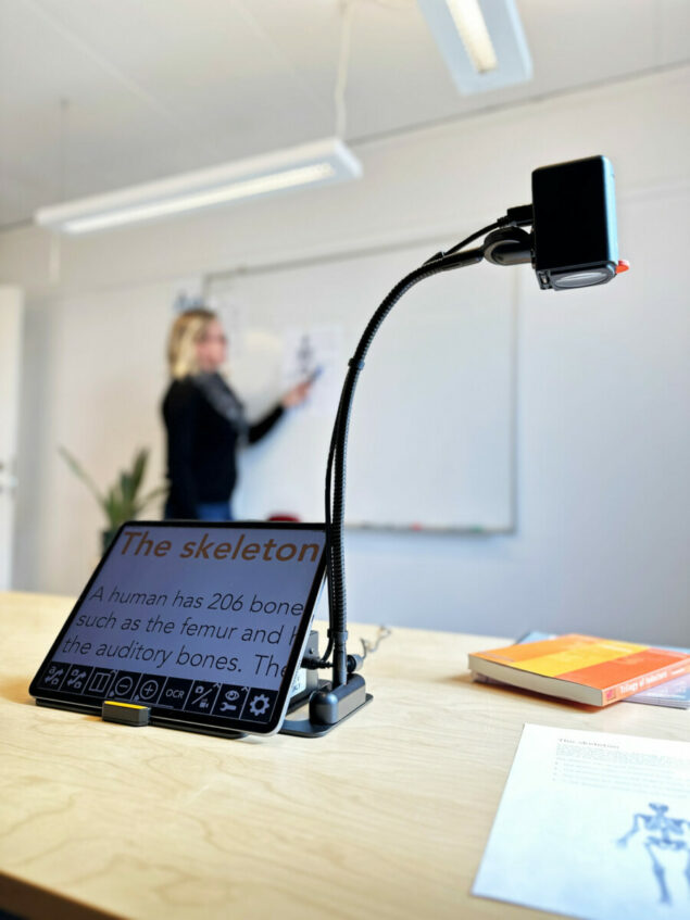 MagniLink WifiCam on desk showing whiteboard on iPad
