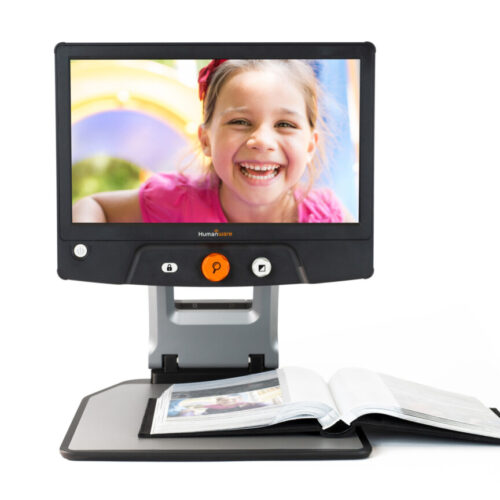 Reveal 16 Desktop Magnifier with book on XY Table and face on the screen