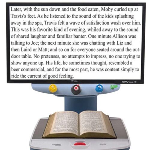 Front image of a TOPAZ EX HD Desktop Video Magnifier with book on an XY table and on the monitor