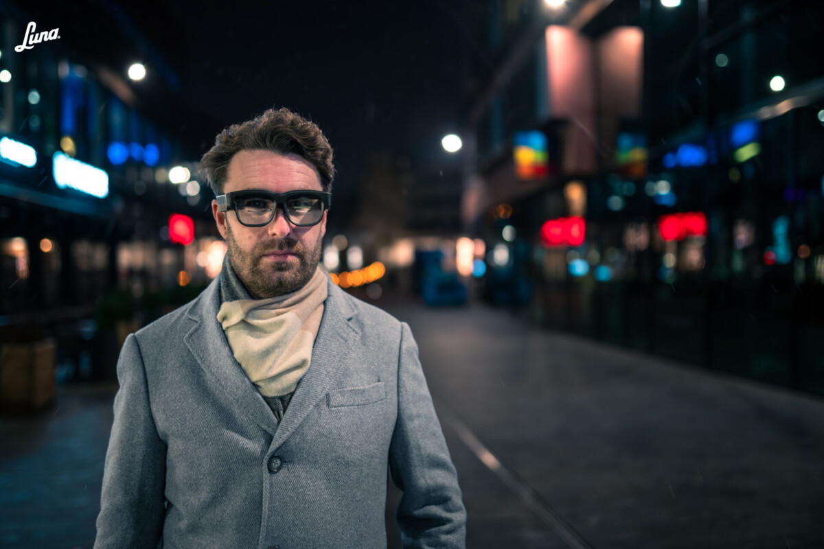 Person outside at night wearing the Luna Glass