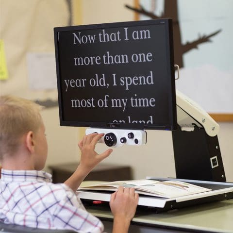 Rehab i-See 22 Desktop Magnifer-Student using in classroom